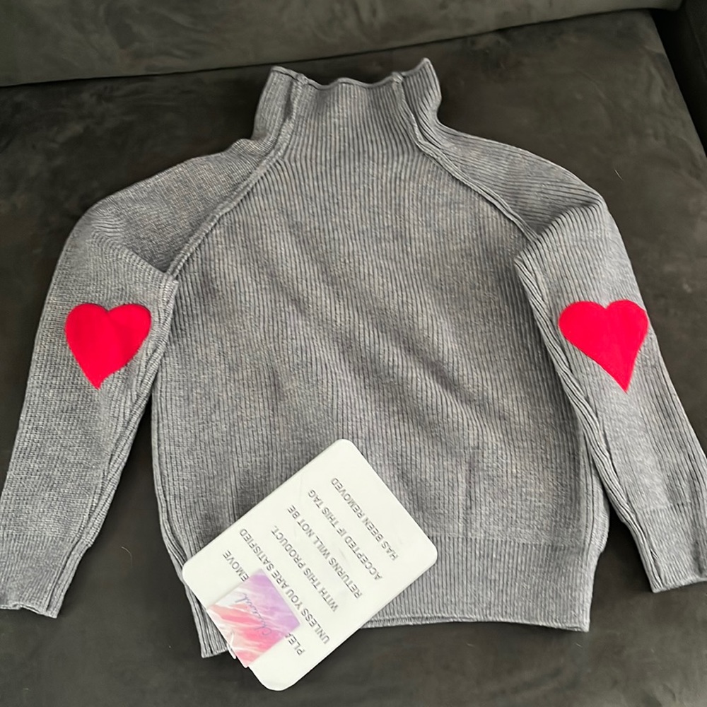Heart patchwork turtleneck sweater